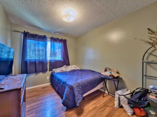 8534 21 Avenue, Coleman, AB - Indoor Photo Showing Bedroom