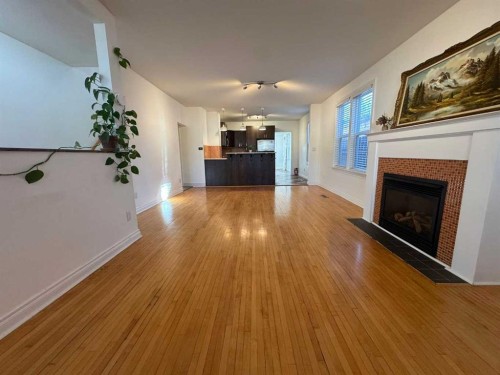 721 6 Street South, Lethbridge, AB - Indoor Photo Showing Living Room With Fireplace