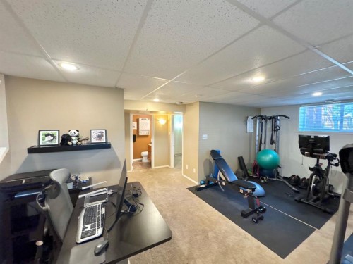 222 Heritage Circle West, Lethbridge, AB - Indoor Photo Showing Gym Room