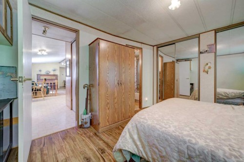 5670 16 Avenue, Coleman, AB - Indoor Photo Showing Bedroom