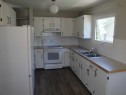 39 Meadowlark Boulevard North, Lethbridge, AB  - Indoor Photo Showing Kitchen With Double Sink 