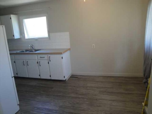 39 Meadowlark Boulevard North, Lethbridge, AB - Indoor Photo Showing Kitchen With Double Sink