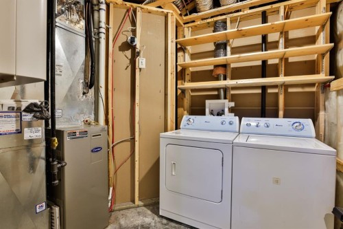 215 Haru Moriyama Place North, Lethbridge, AB - Indoor Photo Showing Laundry Room
