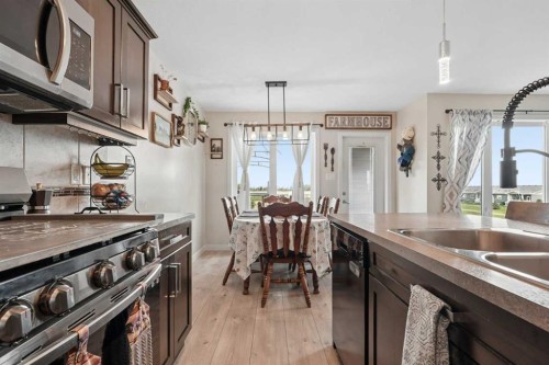 648 Parkside Green, Coaldale, AB - Indoor Photo Showing Kitchen With Double Sink