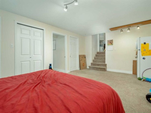 106 Ojibwa Place West, Lethbridge, AB - Indoor Photo Showing Bedroom