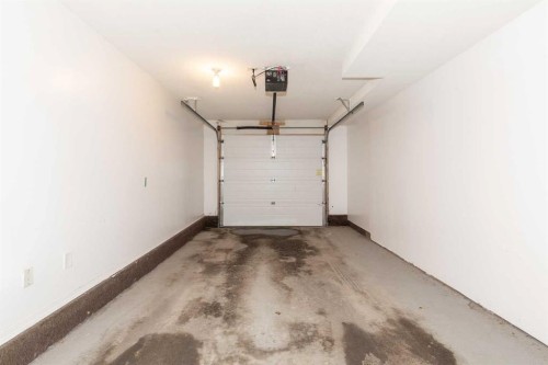 2-101 Silkstone Road West, Lethbridge, AB - Indoor Photo Showing Garage