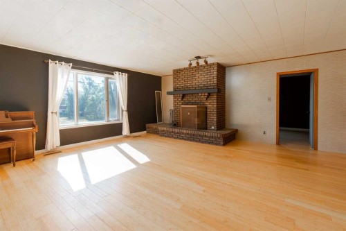 180 E 400 N, Raymond, AB - Indoor With Fireplace