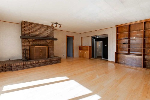 180 E 400 N, Raymond, AB - Indoor With Fireplace