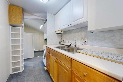 538 12C Street North, Lethbridge, AB - Indoor Photo Showing Kitchen With Double Sink