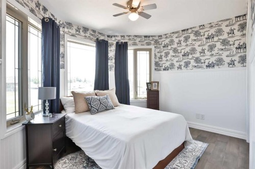 406 Meadow Lark Drive, Rural Lethbridge County, AB - Indoor Photo Showing Bedroom