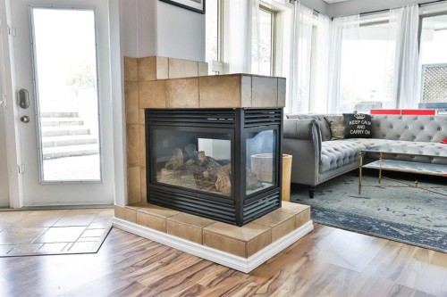 406 Meadow Lark Drive, Rural Lethbridge County, AB - Indoor Photo Showing Living Room With Fireplace