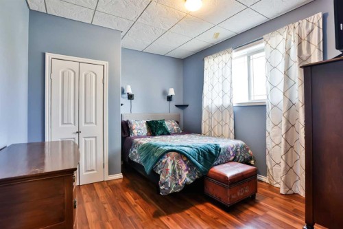 406 Meadow Lark Drive, Rural Lethbridge County, AB - Indoor Photo Showing Bedroom