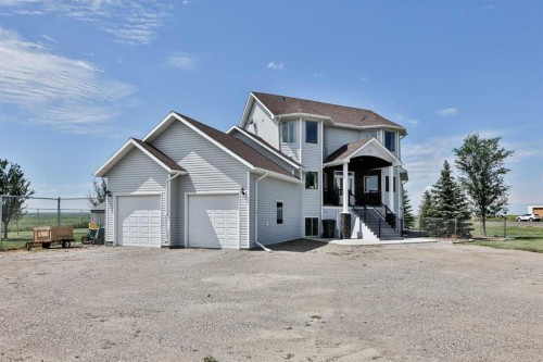 406 Meadow Lark Drive, Rural Lethbridge County, AB - Outdoor With Facade