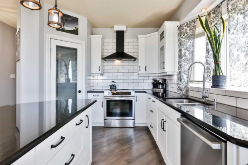 406 Meadow Lark Drive, Rural Lethbridge County, AB - Indoor Photo Showing Kitchen With Stainless Steel Kitchen With Double Sink With Upgraded Kitchen