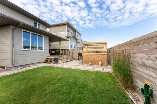 437 Devonia Way West, Lethbridge, AB - Outdoor With Exterior