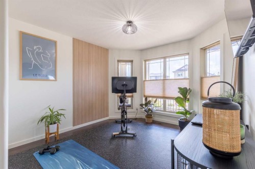 515 Canyon Cove West, Lethbridge, AB - Indoor Photo Showing Gym Room