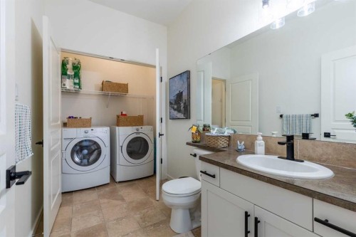 515 Canyon Cove West, Lethbridge, AB - Indoor Photo Showing Laundry Room