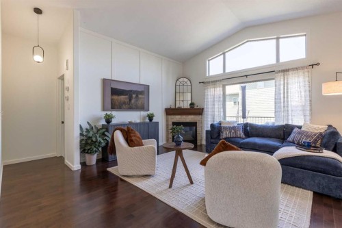 515 Canyon Cove West, Lethbridge, AB - Indoor Photo Showing Living Room With Fireplace