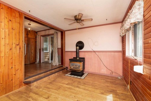 1238 7 Avenue South, Lethbridge, AB - Indoor Photo Showing Other Room With Fireplace