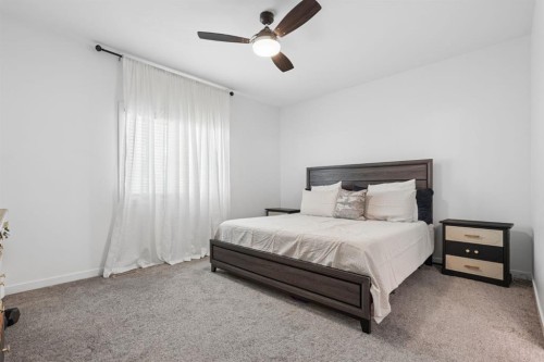 409 Devonia Way West, Lethbridge, AB - Indoor Photo Showing Bedroom