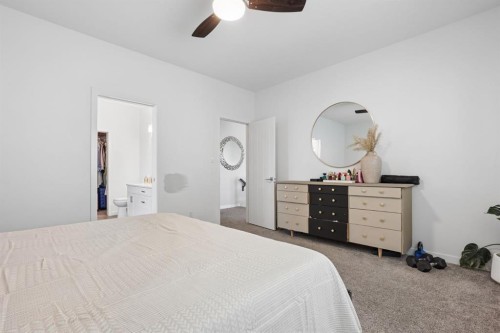 409 Devonia Way West, Lethbridge, AB - Indoor Photo Showing Bedroom