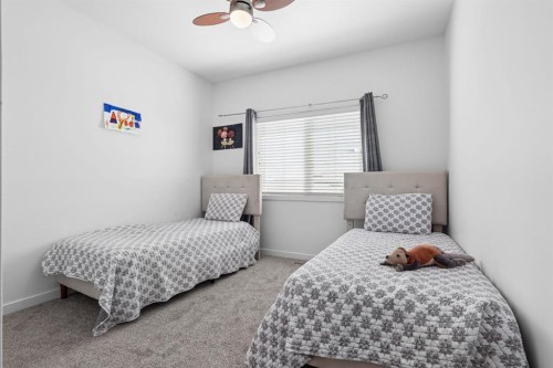 409 Devonia Way West, Lethbridge, AB - Indoor Photo Showing Bedroom