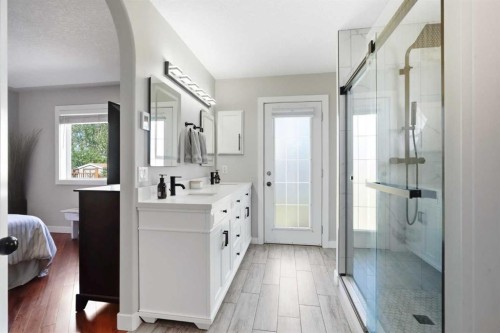 14 Lloyd Crescent Ne, Langdon, AB - Indoor Photo Showing Bathroom