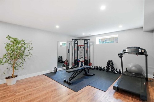 14 Lloyd Crescent Ne, Langdon, AB - Indoor Photo Showing Gym Room