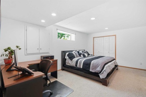 14 Lloyd Crescent Ne, Langdon, AB - Indoor Photo Showing Bedroom
