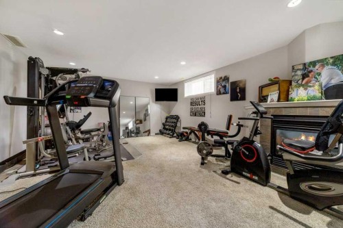 215 Grand River Boulevard West, Lethbridge, AB - Indoor Photo Showing Gym Room
