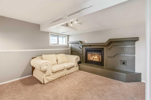194 Mt Blakiston Road West, Lethbridge, AB - Indoor With Fireplace