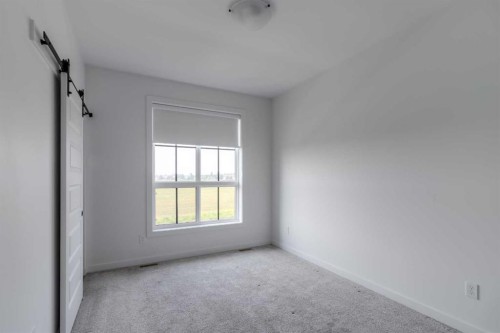 633 Blackwolf Boulevard North, Lethbridge, AB - Indoor Photo Showing Other Room