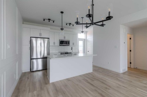 633 Blackwolf Boulevard North, Lethbridge, AB - Indoor Photo Showing Kitchen With Stainless Steel Kitchen With Double Sink With Upgraded Kitchen