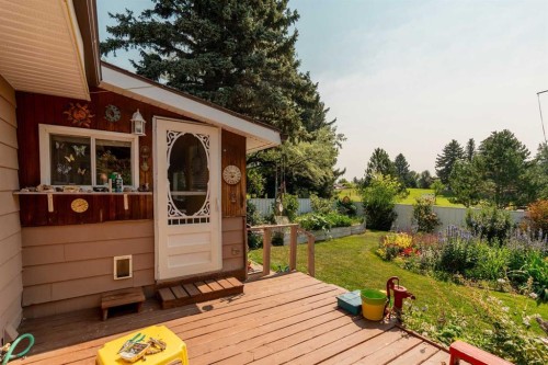 42 Honeysuckle Road North, Lethbridge, AB - Outdoor With Deck Patio Veranda