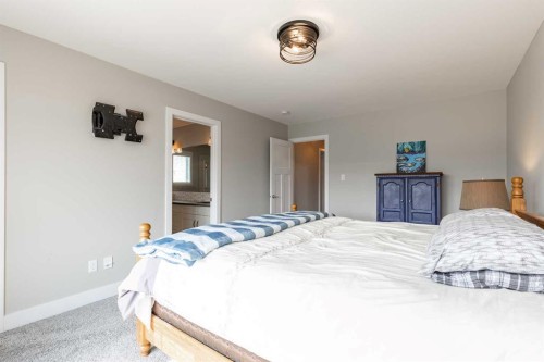 107 Westgate Drive, Coaldale, AB - Indoor Photo Showing Bedroom
