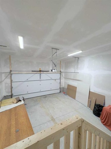 919 Fairway Boulevard, Cardston, AB - Indoor Photo Showing Garage