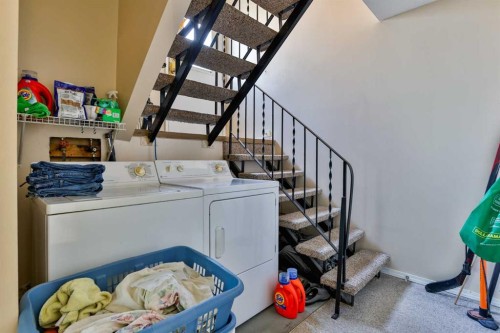 1717 St Edward Boulevard North, Lethbridge, AB - Indoor Photo Showing Laundry Room