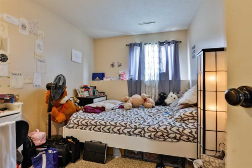 1717 St Edward Boulevard North, Lethbridge, AB - Indoor Photo Showing Bedroom