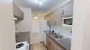 212-401 Columbia Boulevard West, Lethbridge, AB  - Indoor Photo Showing Kitchen With Double Sink 