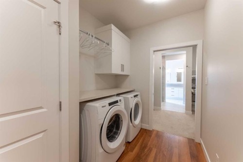 1060 Caledonia Place West, Lethbridge, AB - Indoor Photo Showing Laundry Room