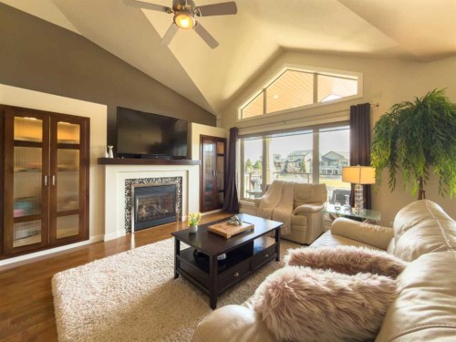 534 Canyon Cove West, Lethbridge, AB - Indoor Photo Showing Living Room With Fireplace