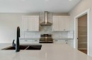 103 Riverford Close West, Lethbridge, AB  - Indoor Photo Showing Kitchen With Double Sink 
