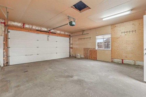 191 Jessie Robinson Close North, Lethbridge, AB - Indoor Photo Showing Garage