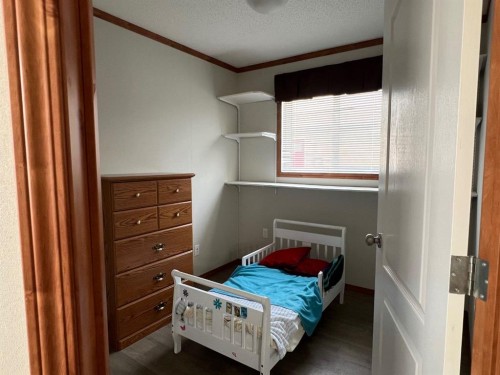 4002 Seasons Boulevard, Coaldale, AB - Indoor Photo Showing Bedroom