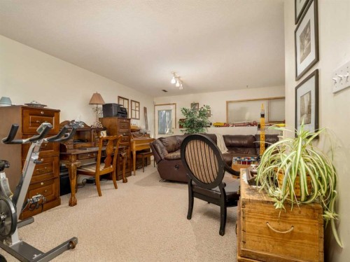 2501 & 2503 24 Street, Coaldale, AB - Indoor Photo Showing Gym Room