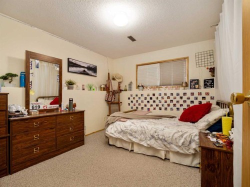 2501 & 2503 24 Street, Coaldale, AB - Indoor Photo Showing Bedroom