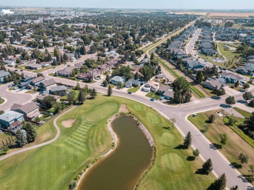 2501 & 2503 24 Street, Coaldale, AB - Outdoor With Body Of Water With View