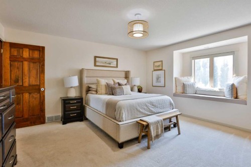 304 S 150 W, Raymond, AB - Indoor Photo Showing Bedroom