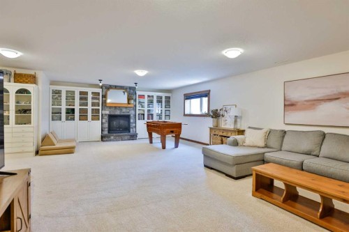 304 S 150 W, Raymond, AB - Indoor Photo Showing Living Room With Fireplace