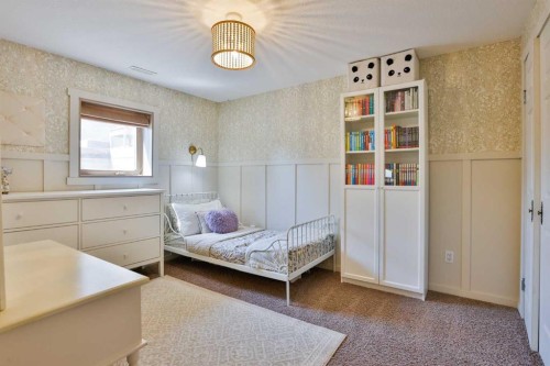 304 S 150 W, Raymond, AB - Indoor Photo Showing Bedroom
